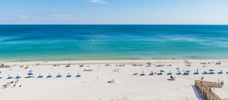 Beach chairs beside the Gulf