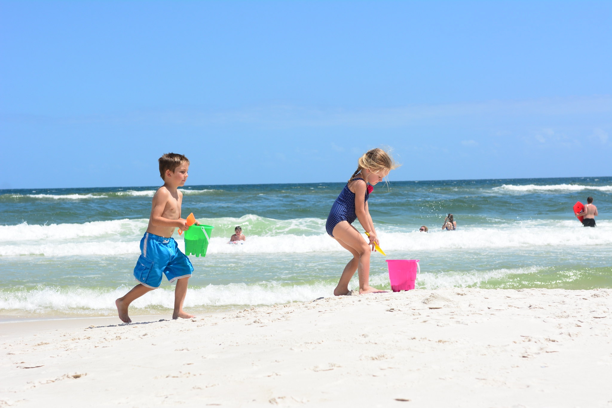 Children playing near the water