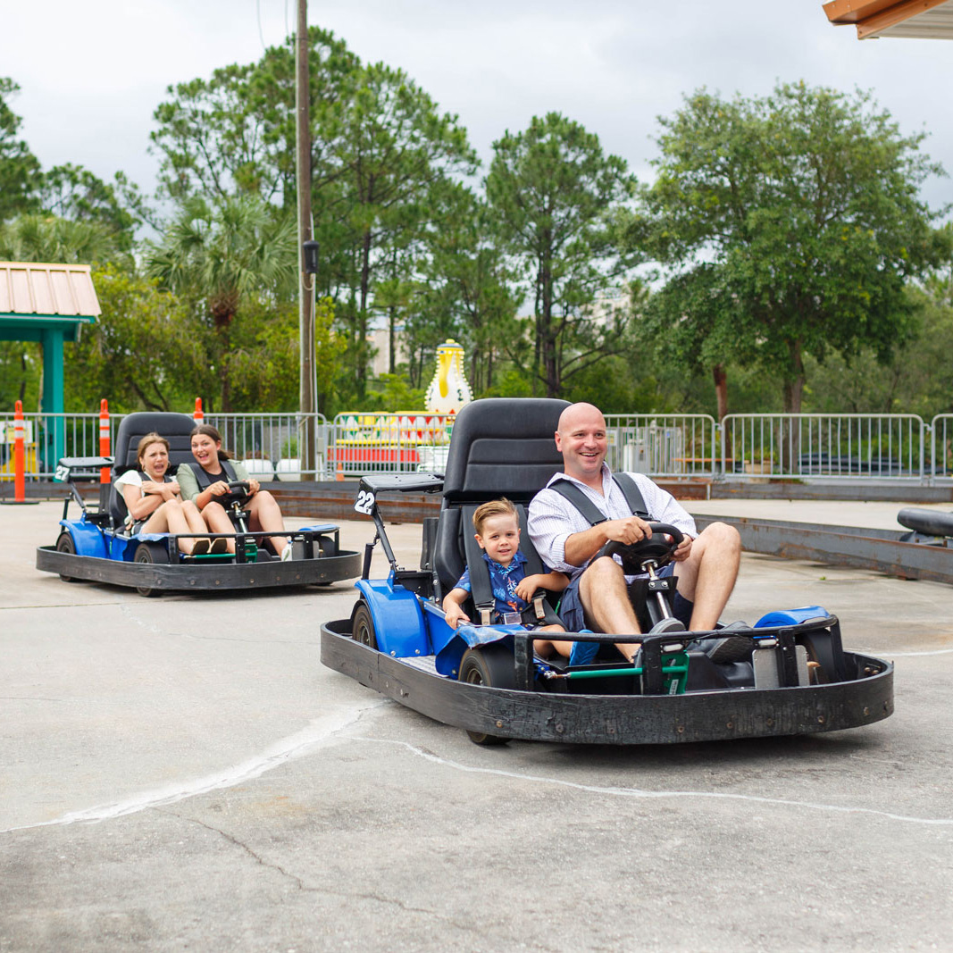Families on go-karts at Adventure Island