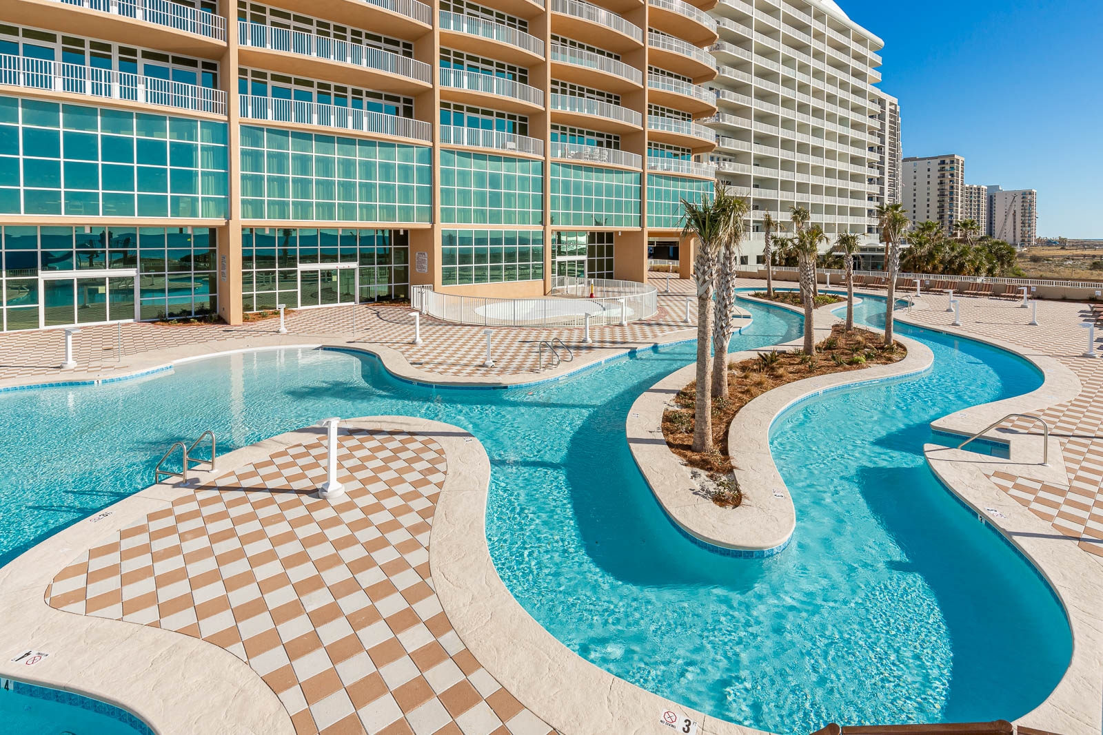 Beautiful Gulf Shores beach with soft waves and clear skies