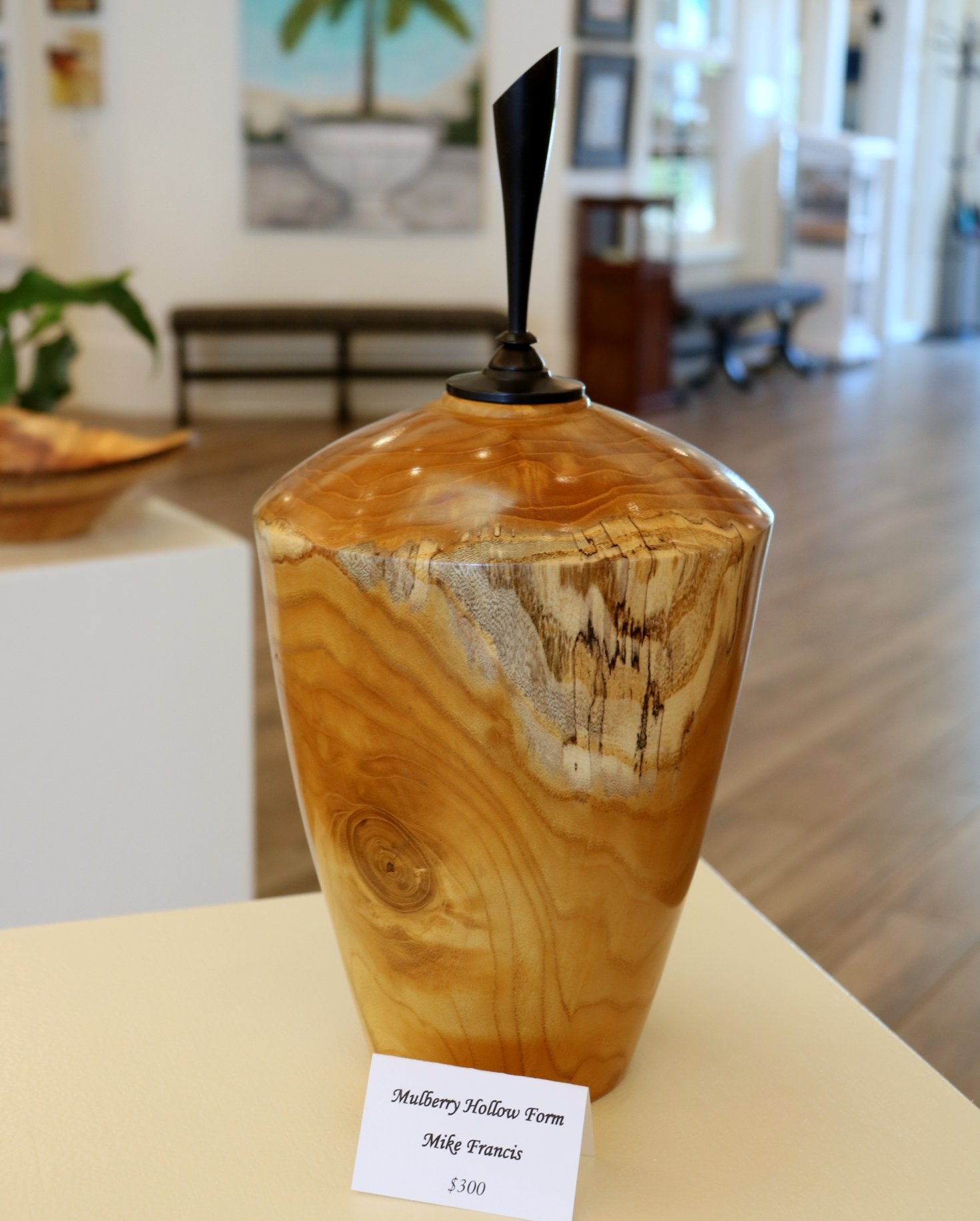 Wood sculpture exhibition at Coastal Arts Center in Orange Beach