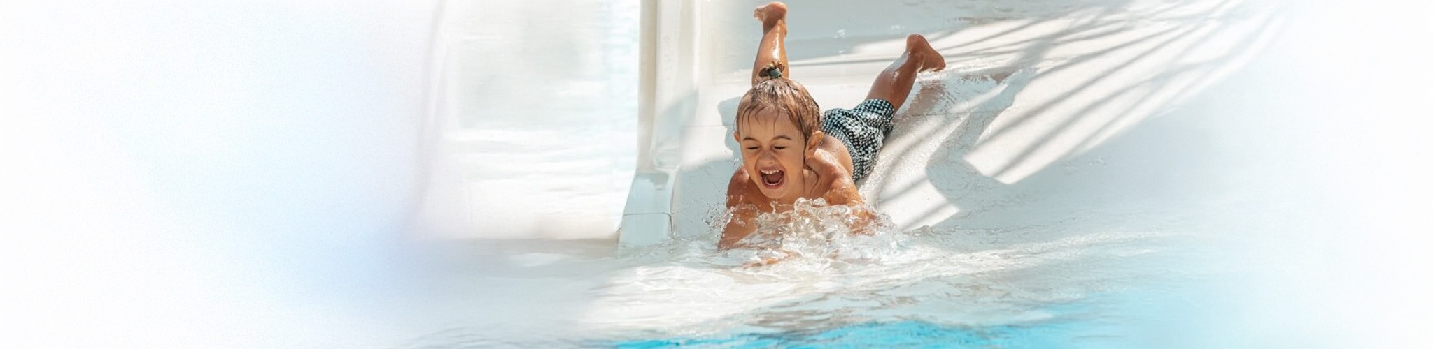Child enjoying a water slide
