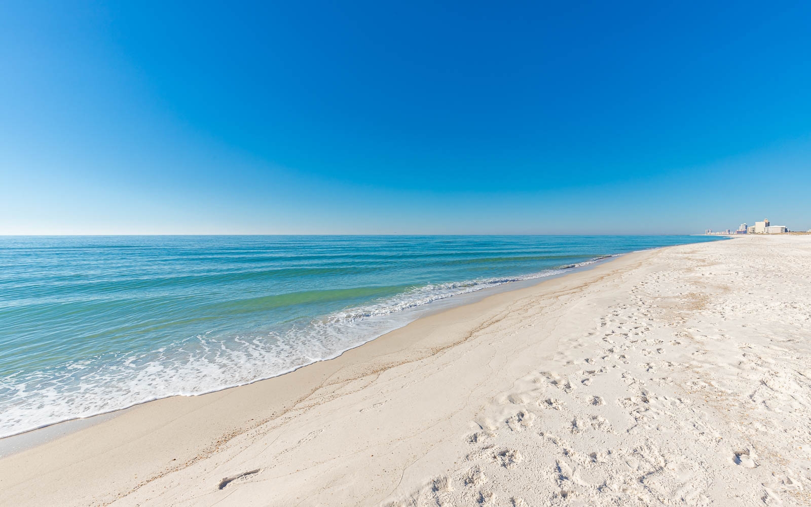 White-sand beach beside the Gulf