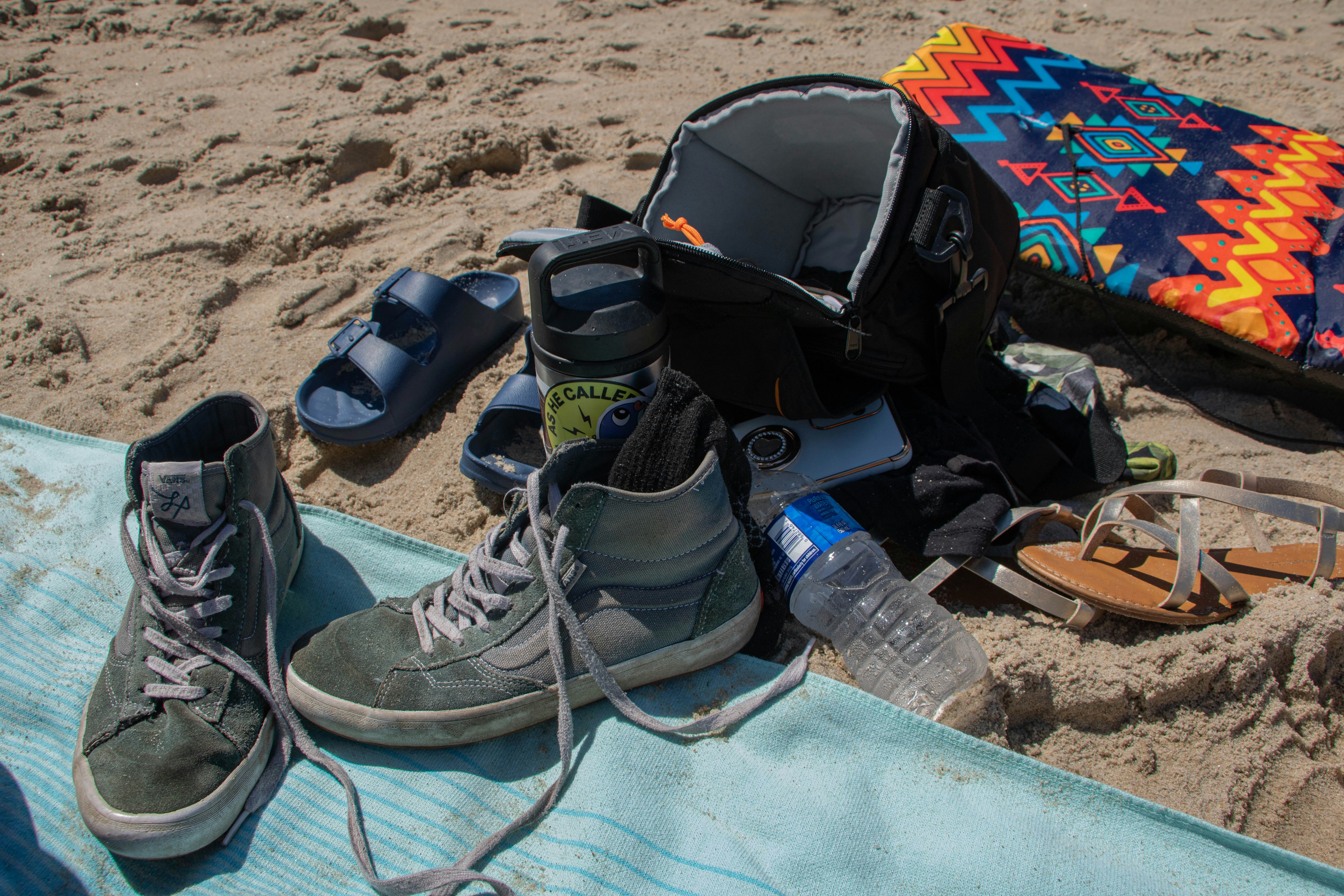 Beach outfits and footwear laid out