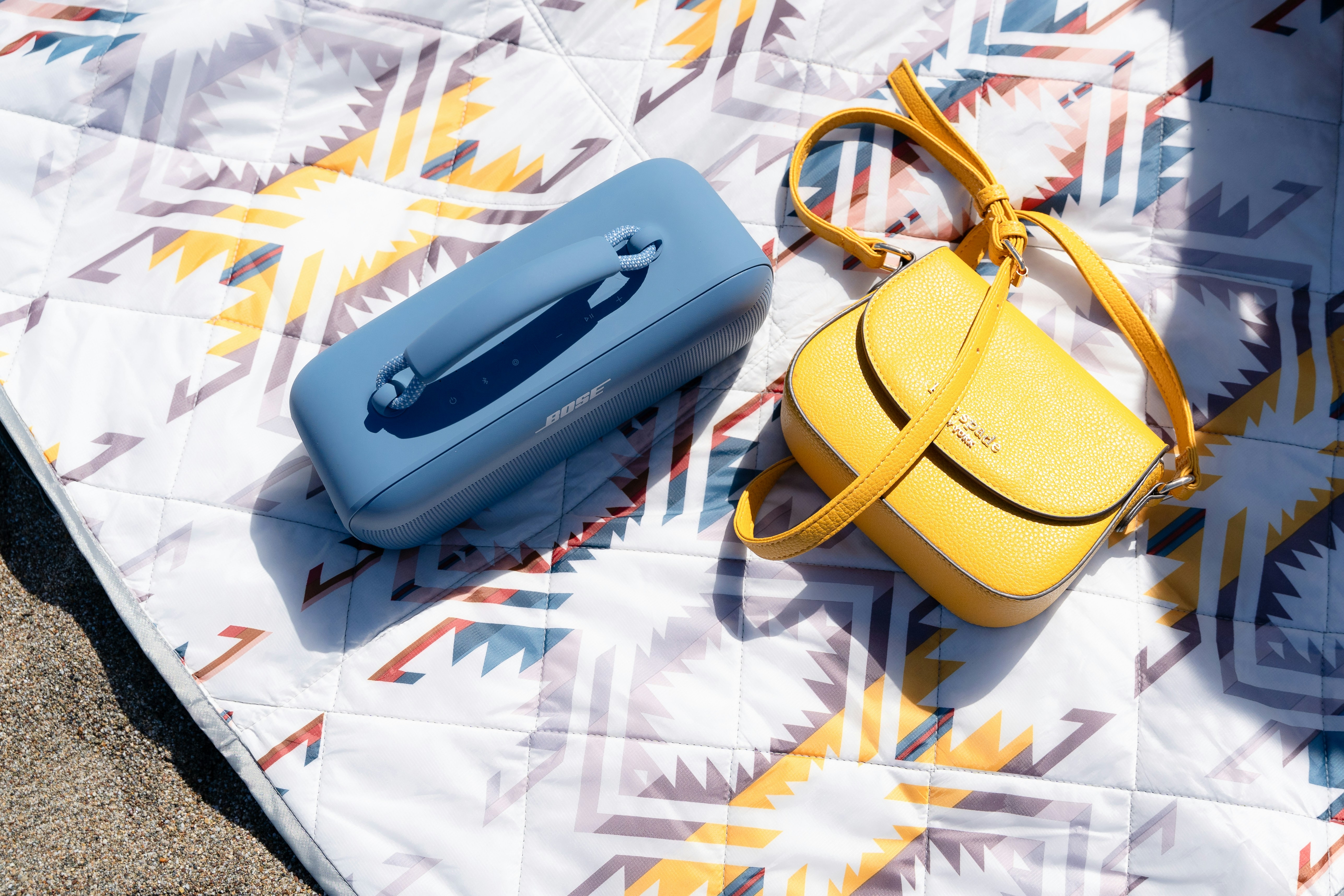 Organized beach packing checklist on sandy shore