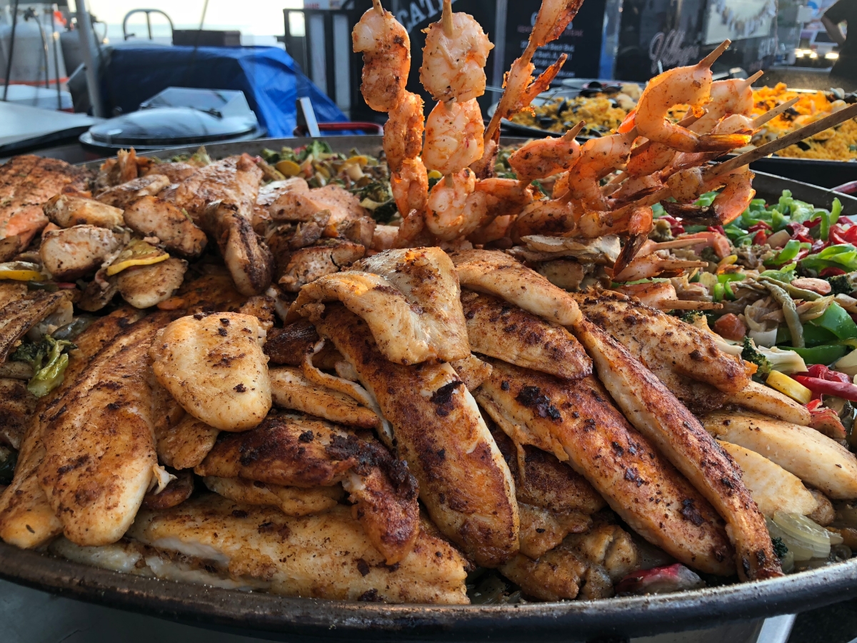 Shrimp and other food on a festival cooking surface