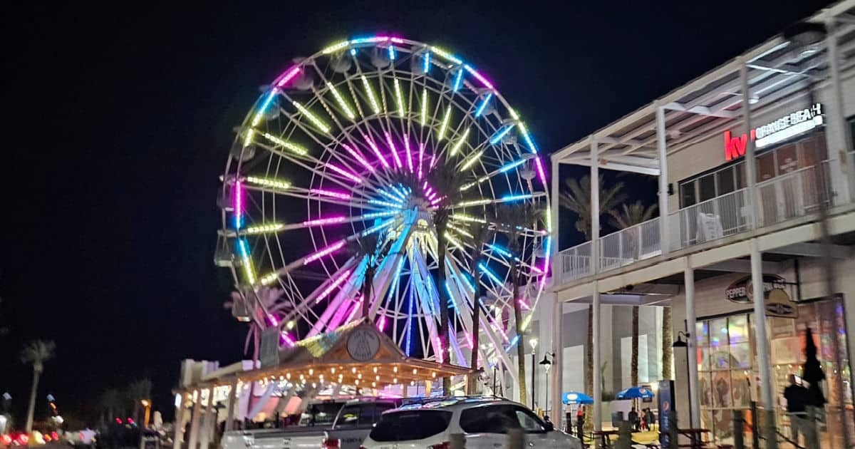 The Wharf Ferris wheel illuminated at night