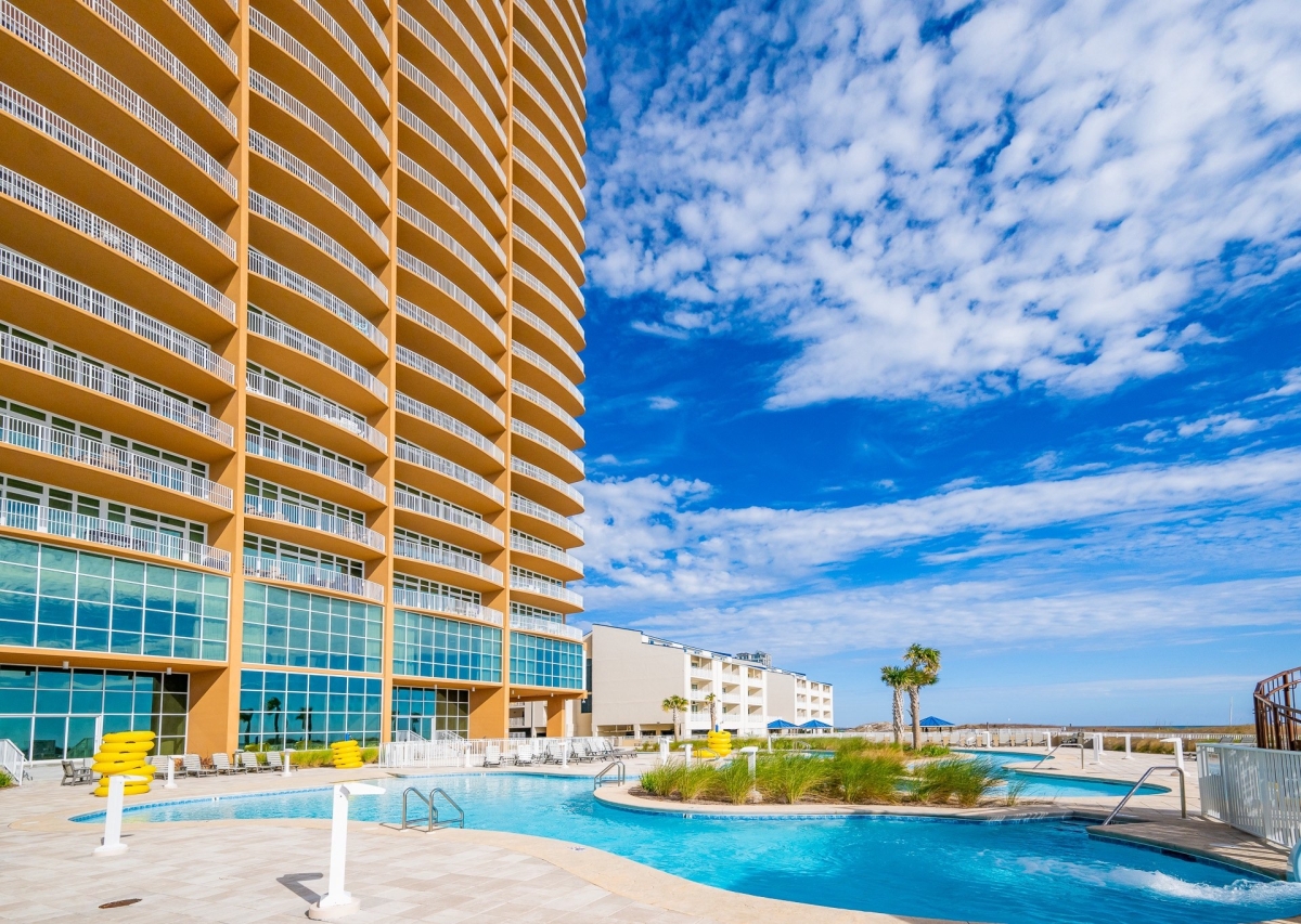 Pool and lazy river beside Phoenix Gulf Towers in Orange Beach