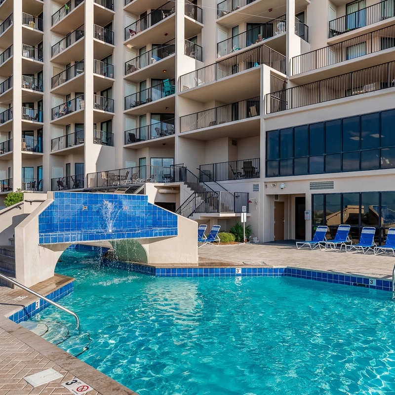Outdoor pool with waterfall at Phoenix East