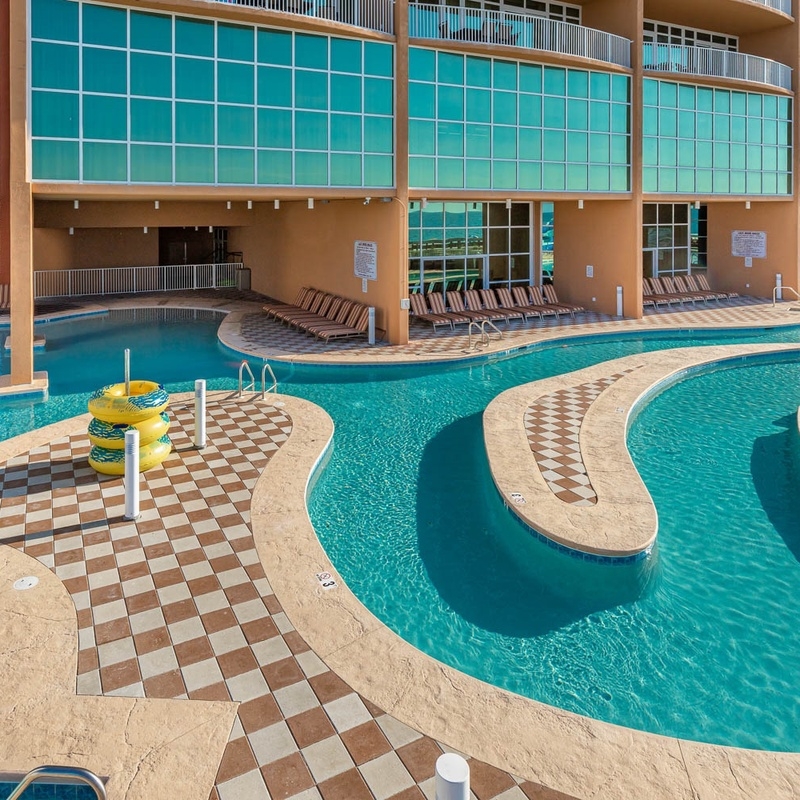 Curving lazy river on the pool deck at Phoenix Orange Beach