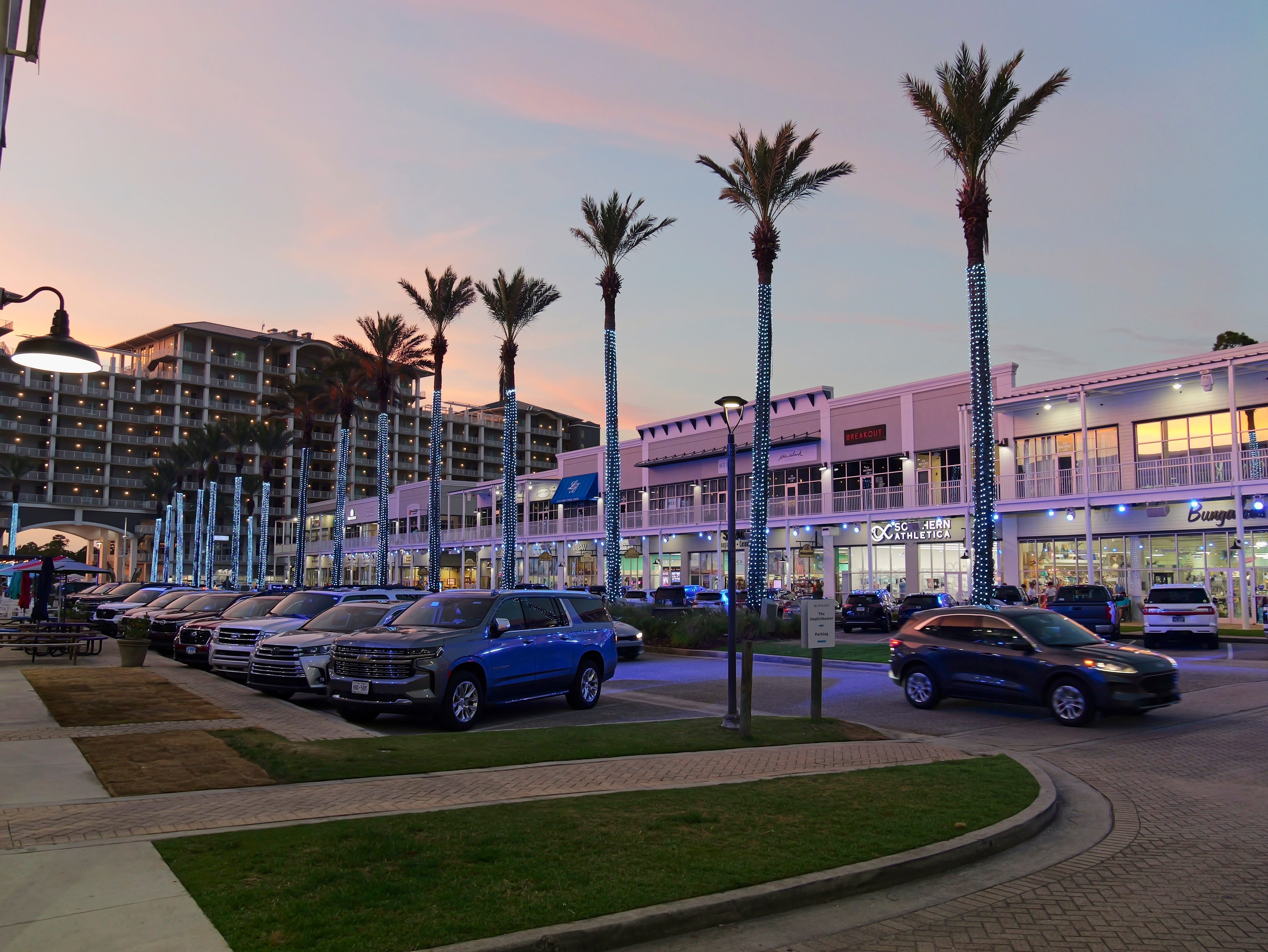 The Wharf in Orange Beach Alabama featuring shops, dining, and a Ferris wheel